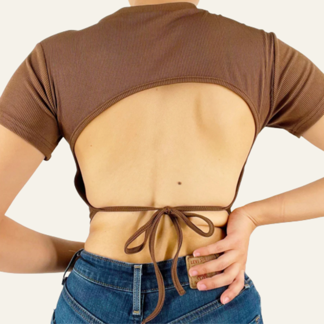 Luna open back crop top in the color chocolate. Its ribbed texture, along with double layer fabric in front and single layer in back give this crop top a classic look.